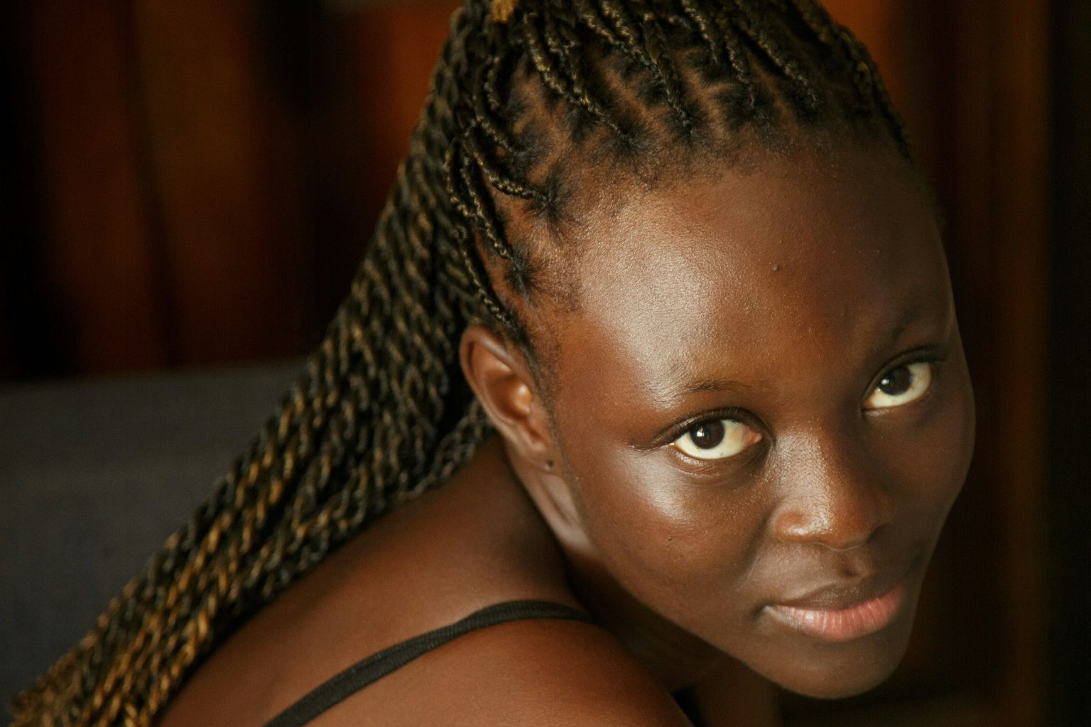 a woman looking at the camera